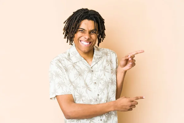Young African American Rasta Man Shocked Pointing Index Fingers Copy — Stock Photo, Image