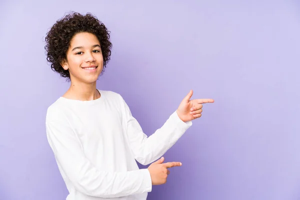 African American Little Boy Isolated Excited Pointing Forefingers Away — Stock Photo, Image