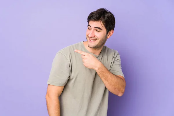 Young Man Isolated Purple Background Looks Aside Smiling Cheerful Pleasant — Stock Photo, Image