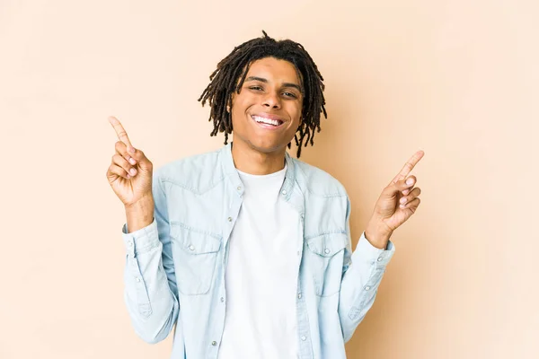 Young African American Rasta Man Pointing Different Copy Spaces Choosing — Stock Photo, Image