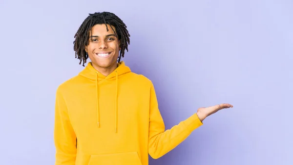 Young African American Rasta Man Showing Copy Space Palm Holding — Stock Photo, Image