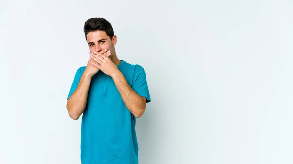 Young Caucasian Man Isolated White Background Covering Mouth Hands Looking — Stock Photo, Image