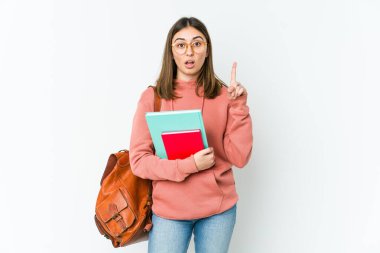 Beyaz fırında izole edilmiş genç bir kız öğrencinin harika bir fikri var, yaratıcılık kavramı..