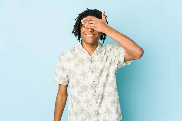 Young African American Rasta Man Covers Eyes Hands Smiles Broadly — Stock Photo, Image