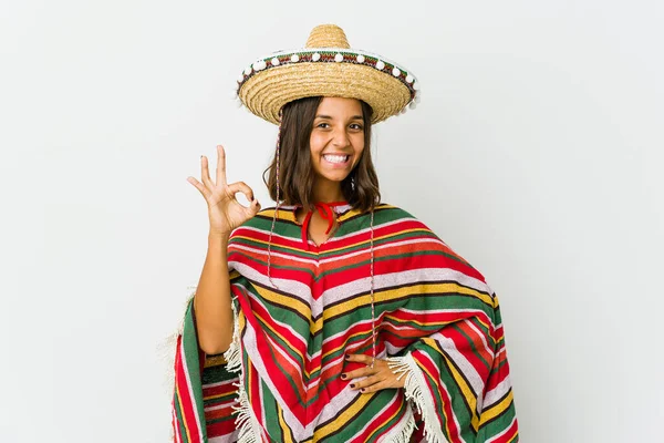 Young mexican woman isolated on white background cheerful and confident showing ok gesture.
