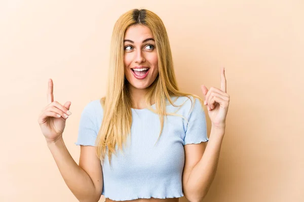Young Blonde Caucasian Woman Indicates Both Fore Fingers Showing Blank — Stock Photo, Image
