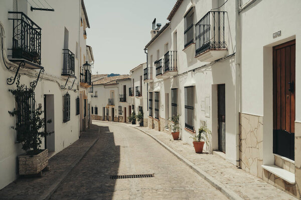 Empty white old town street in Andalusia, Spain.