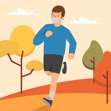 Tek başına koşan bir adam tıbbi maske takıyor.