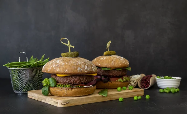 Vegan burger made of beans, beetroot, and peas