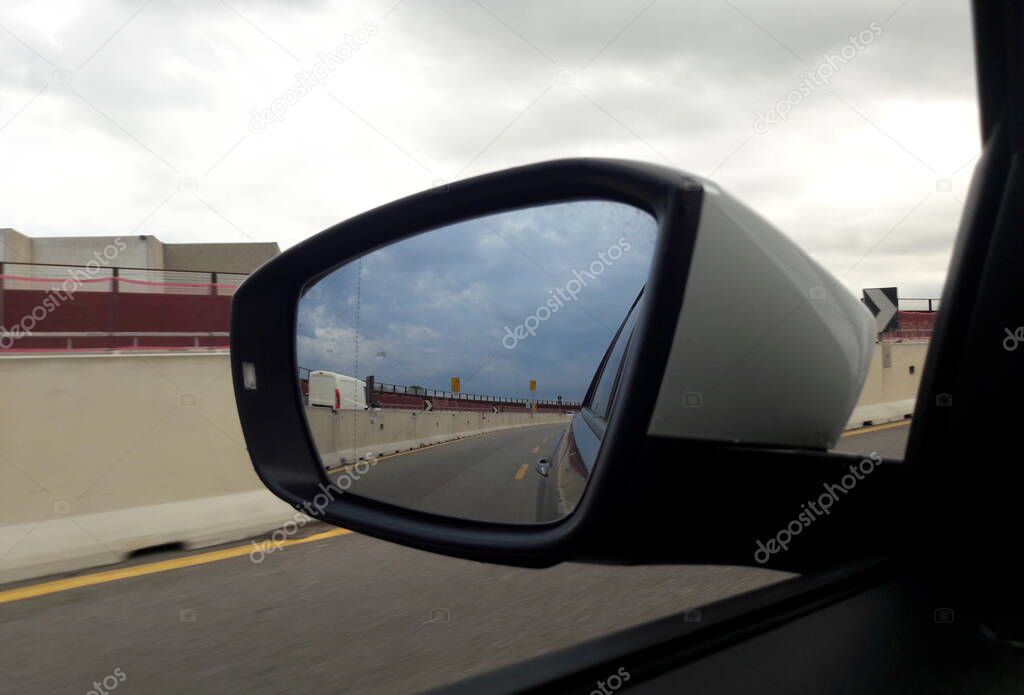 Car rearview mirror - going on a long journey