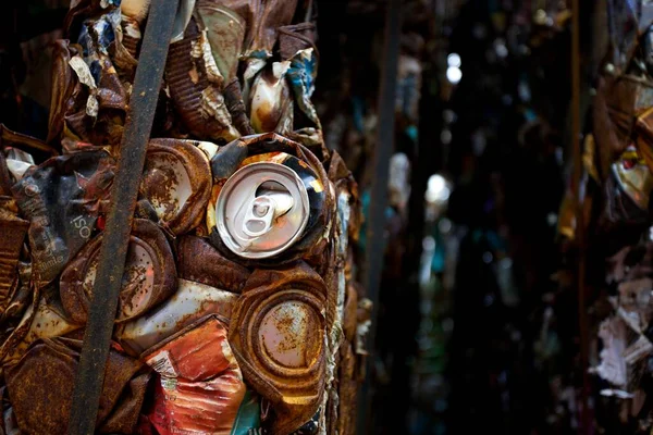 Flattered cans in a recycling plant in the UK