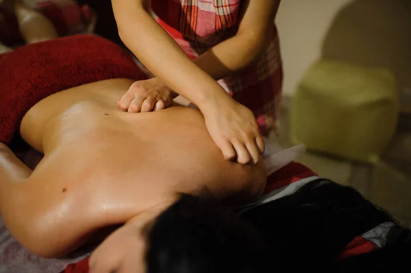 Woman Gives Two Handed Back Massage Girl Lying Spa Center — Stock Photo, Image