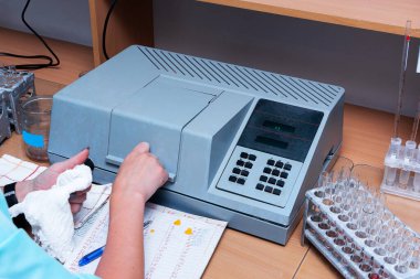 Photometer. A photometer is used in the laboratory for conducting chemical analyzes for patients. Medical equipment clipart
