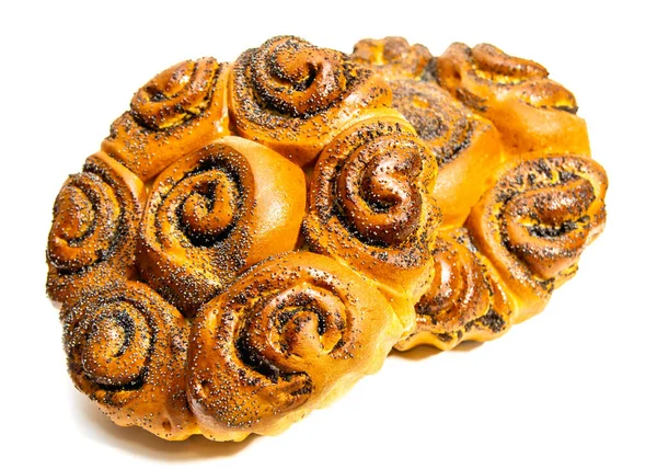 Tatlı çörek ve hafif arka planda haşhaş tohumu.