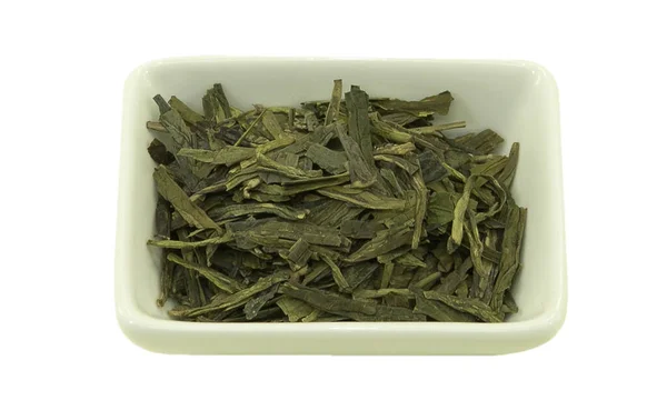 Lundzin Chińska Zielona Herbata Prostokątnym Spodku Przed Gotowaniem Odizolowany Brak Zdjęcie Stockowe