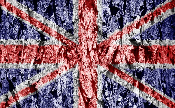 UK flag on bark texture background. Background for greeting cards for UK public holidays. Day of Remembrance and Reconciliation. May holiday. Spring day off. Queen's birthday.