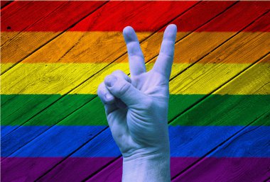 LGBT. Gökkuşağı arka planında zafer jesti. Şablon. Tasarımcı için içerik.