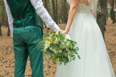 Düğün buketi. Düğündeki en önemli buket gelinin buketidir..