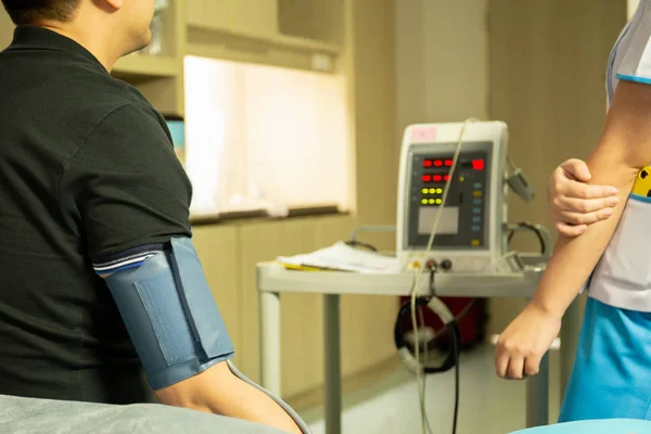 Nurse Checking Blood Pressure Monitor Screen Patient Health Hospital — Stock Photo, Image