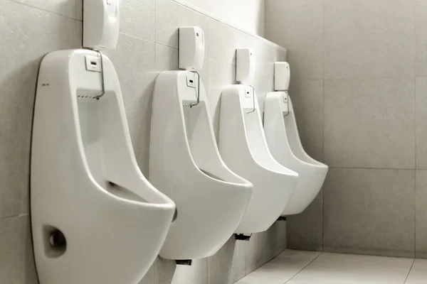 White urinals in a row in men public toilet. — Stock Photo, Image