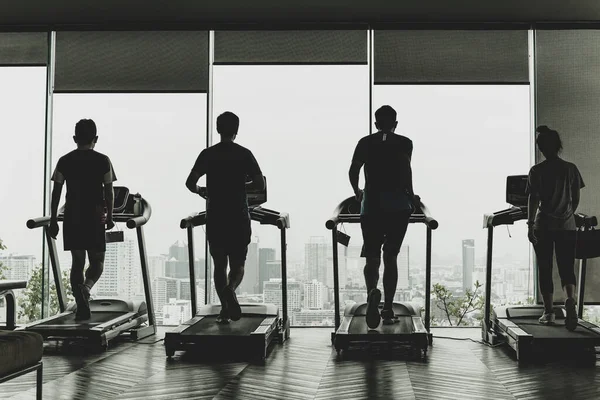 Menschensilhouette Beim Joggen Auf Dem Laufband Fitnessstudio — Stockfoto