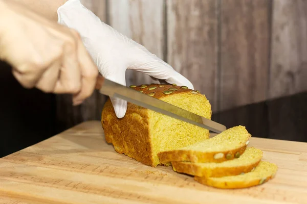 Chef Hands Cutting Pumpkin Bread Wooden Board Selective Focus — Stock Photo, Image