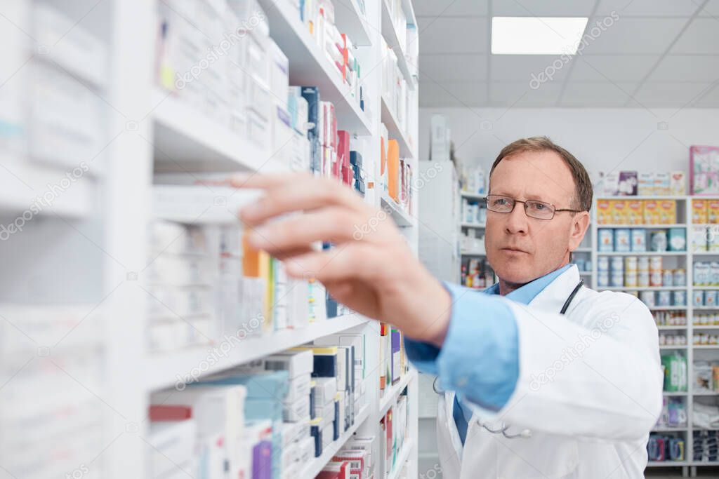 Pharmacist working in a drugstore