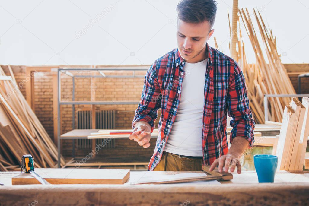 Carpenters at work, constructing and working with wood