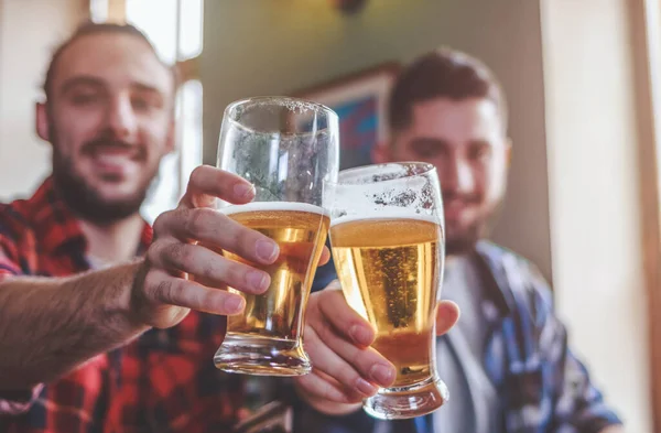 Friends Drinking Beer Clinking Glasses Bar Pub — Stock Photo, Image