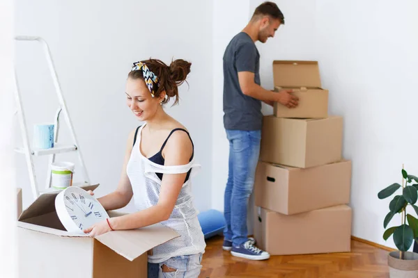 Young Couple Love Moving New House Unpacking Boxes Stock Image