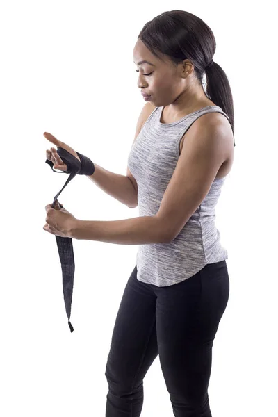 Black Female Fighter Boxer Preparing Wearing Gloves Wrapping Wrist Isolated — Stock Photo, Image