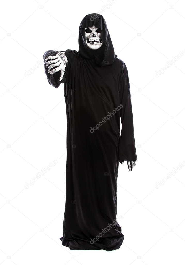 Halloween costume of a skeleton grim reaper wearing a black robe on a white background gesturing thumbs down