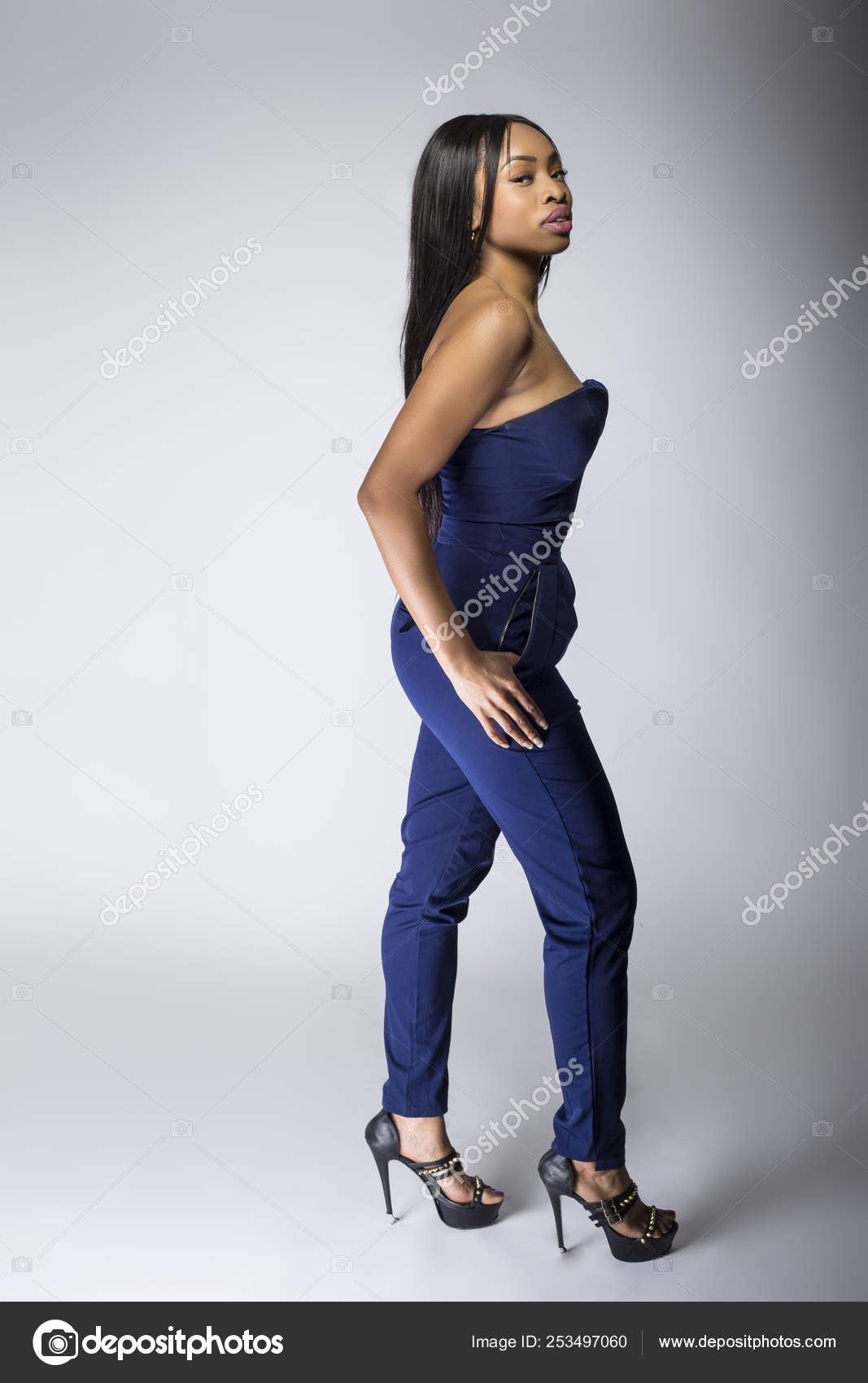 Sexy Black Female Fashion Model Wearing Apparel Blue Pants Outfit