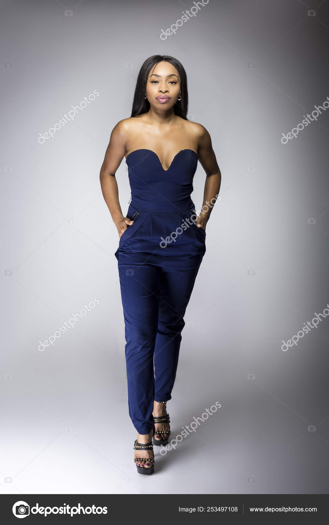 Sexy Black Female Fashion Model Wearing Apparel Blue Pants Outfit Stock  Photo by ©innovatedcaptures 253497108