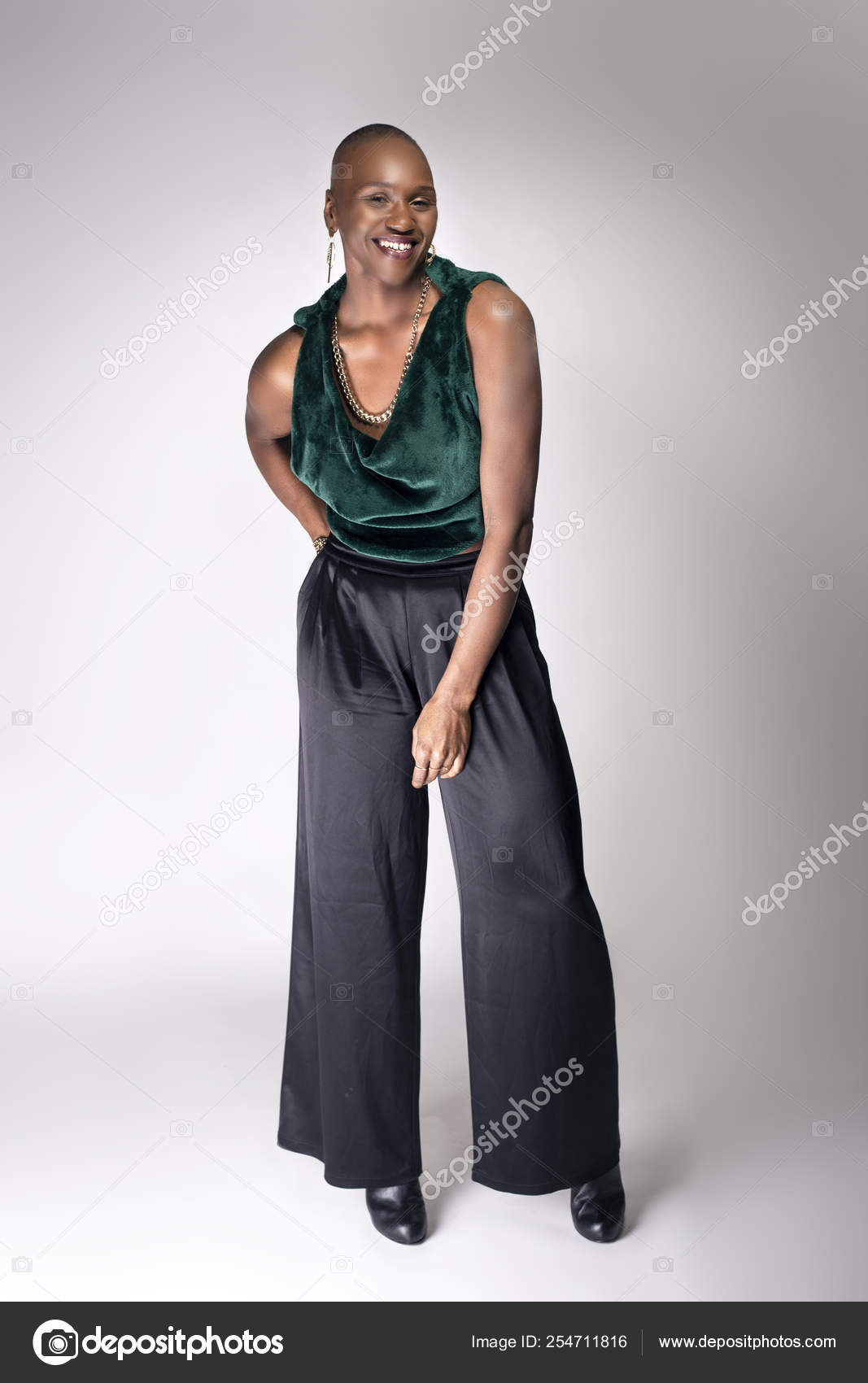 Sexy Black Female Fashion Model Wearing Apparel With Blue Pants