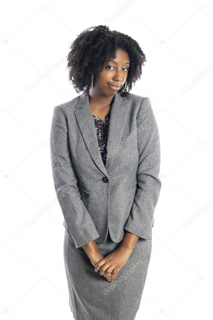 Black African American female businesswoman isolated on a white background looking shy