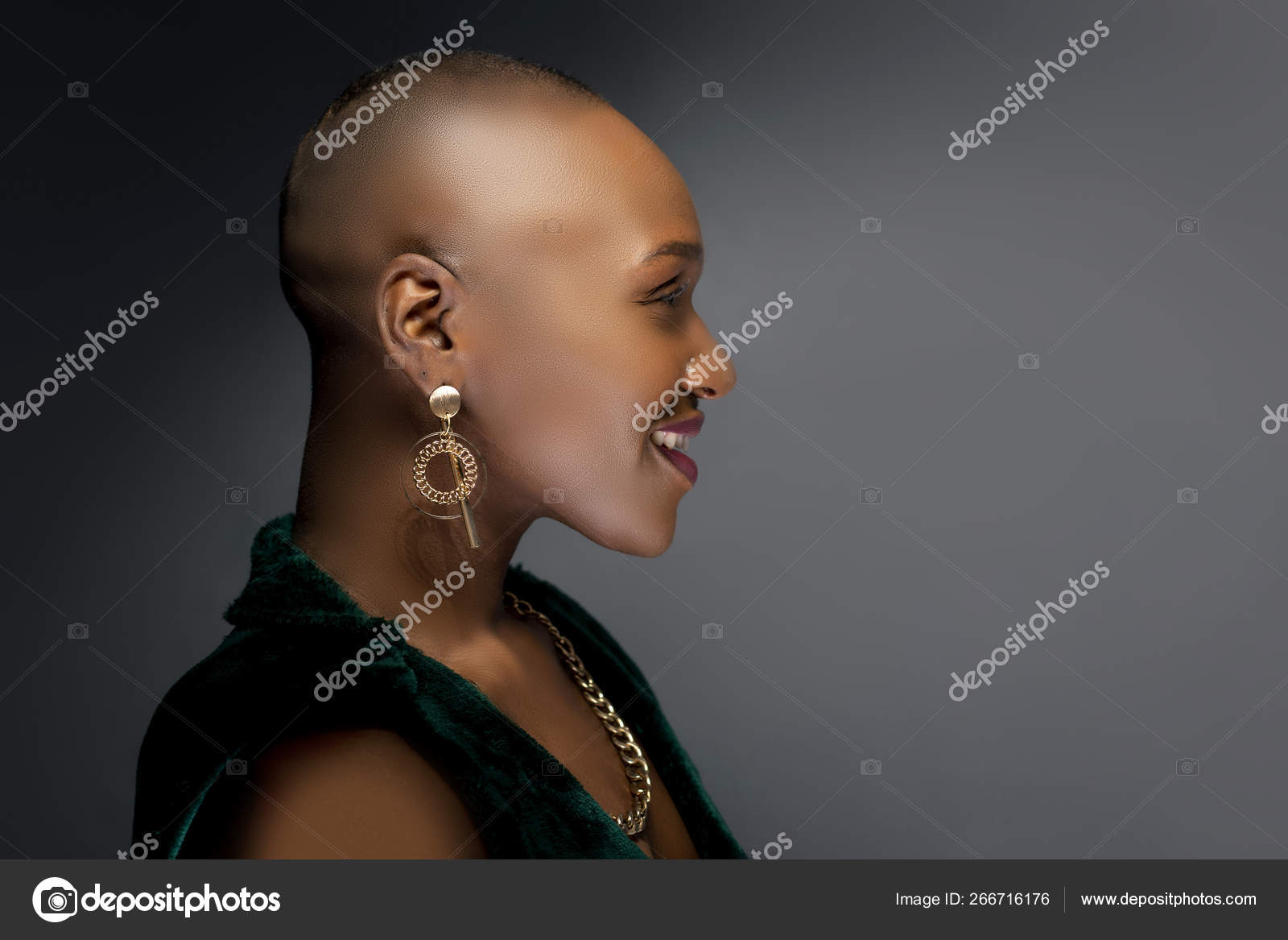 Black African American Female Fashion Model Bald Hairstyle Studio Portrait  Stock Photo by ©innovatedcaptures 266716176