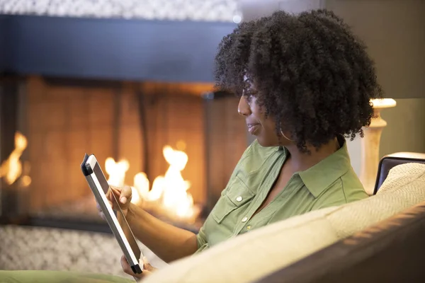 Black African American Female Relaxing Home Reading Browsing Internet Digital — Stock Photo, Image