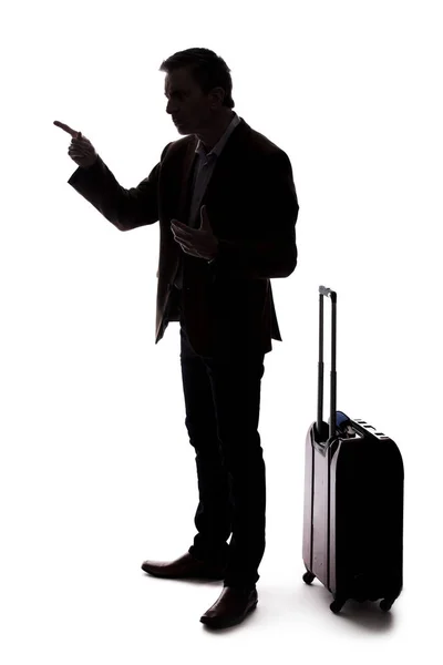 愤怒的商人或携带行李的旅行者的剪影 仿佛在机场就延误或取消问题争吵 游客对旅行的压力感到愤怒 — 图库照片
