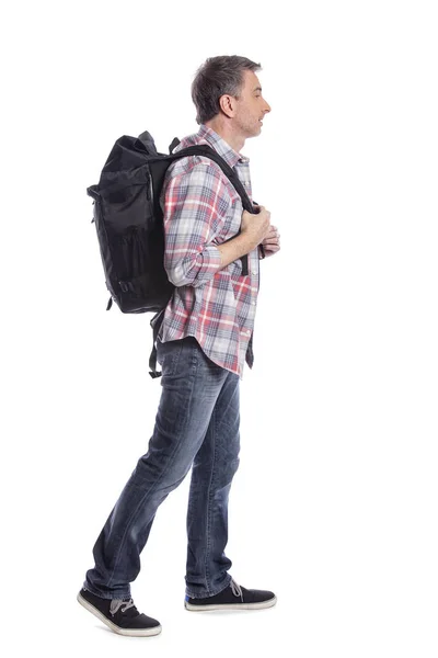 Hombre Mediana Edad Caminando Llevando Una Mochila Sobre Fondo Blanco —  Fotos de Stock