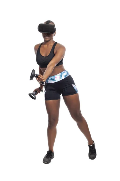 バーチャルリアリティヘッドセットを装着しながら Vrダンスリズムビデオゲームをプレイしてワークアウト黒人アフリカ系アメリカ人の女性 Eスポーツ技術とアクティブなライフスタイルを描く — ストック写真