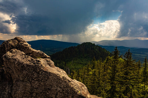 Thunderstorm over Rudawy Janowickie Mountains with a view on Krz