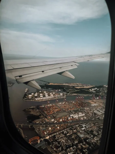 Buenos Aires, Argentina. January 22 2019. Aerial wing airplane. Views through the window of the port.