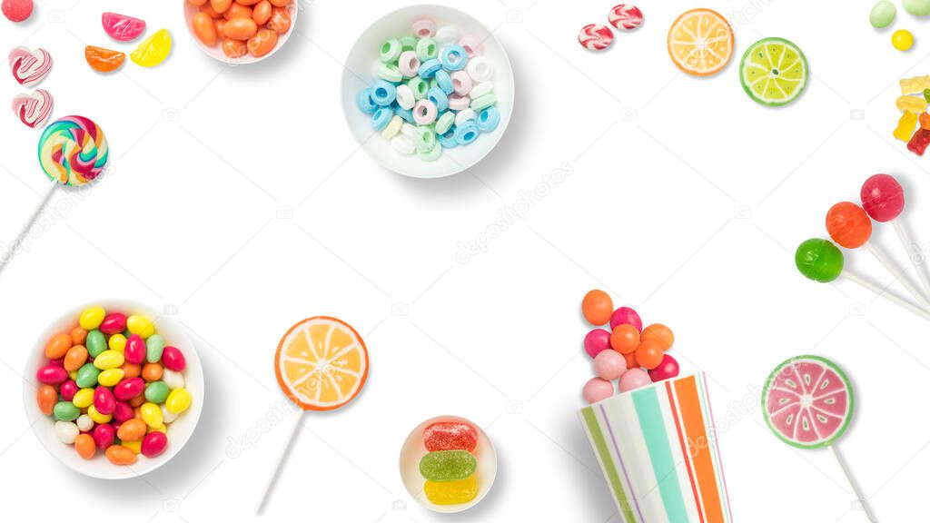 Lollipops and candies. Colorful sweets, festive decoration. Colorful candies on a white background, top view with copy space for message or greeting card. Concept of sweets and sugar.