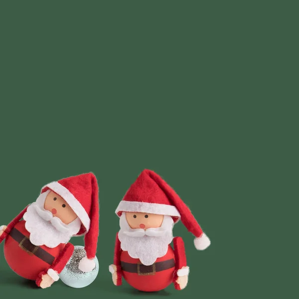 Banner Backdrop Background Two Cute Santa Claus Doll Green Background — Stock Photo, Image