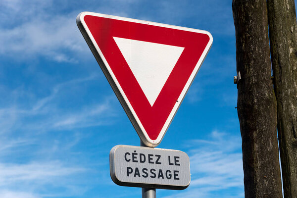 A traffic sign for the right of way on a road in France