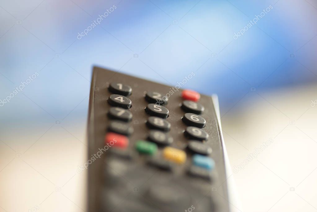 A remote control and a TV