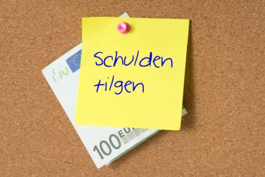 Euro bill ve bir notla metin borç ödemek