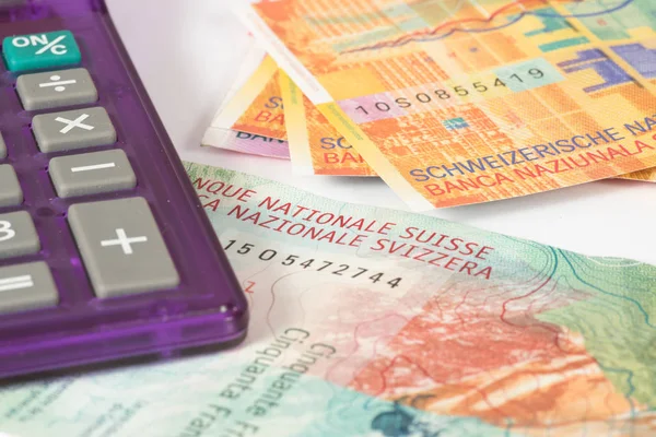 Bir hesap makinesi ve İsviçre Frangı