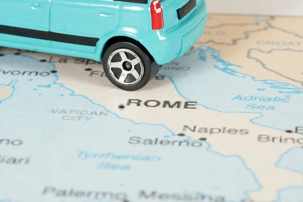 A car and a map of Italy